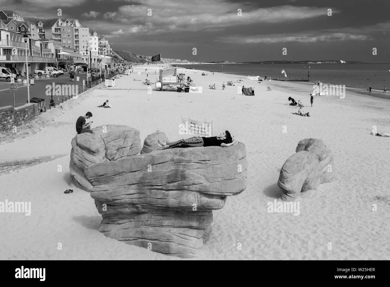 Black and white English seaside scene in modern day. Stock Photo
