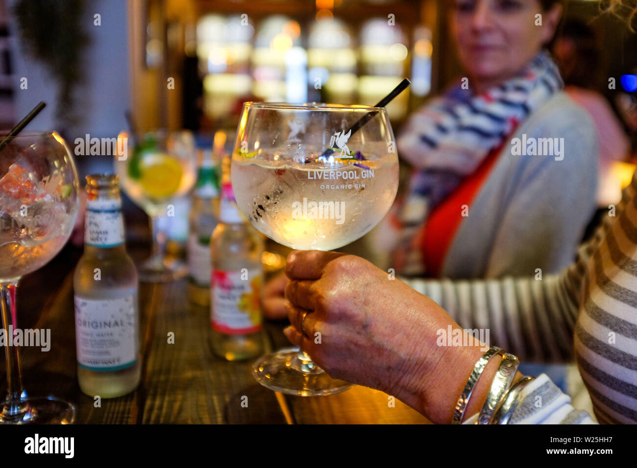 Woman drinking gin hires stock photography and images Alamy