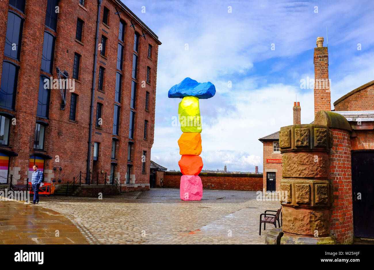 Liverpool Merseyside UK - The Liverpool mountain by Ugo Rondinone by the Tate Gallery in Albert Docks Stock Photo