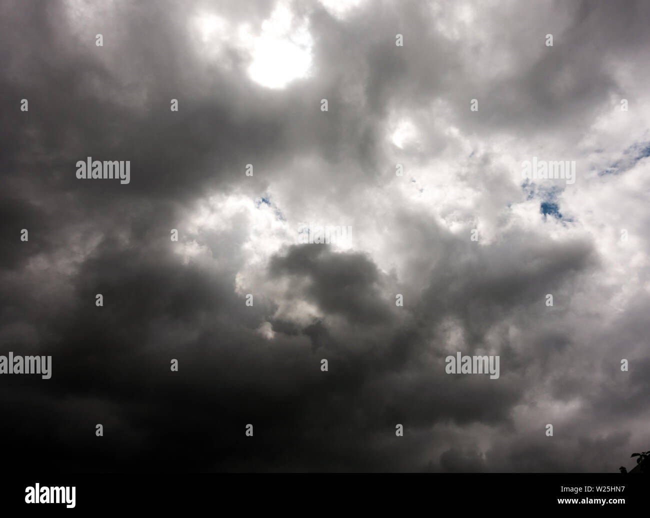 Dark and Dramatic Storm Clouds Area Background Stock Photo