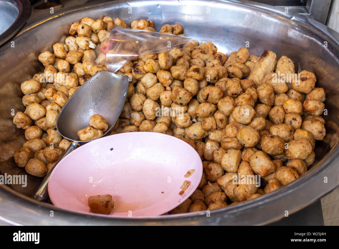 Fried fish balls exposed in a street food restaurant in Bangkok Stock Photo  - Alamy