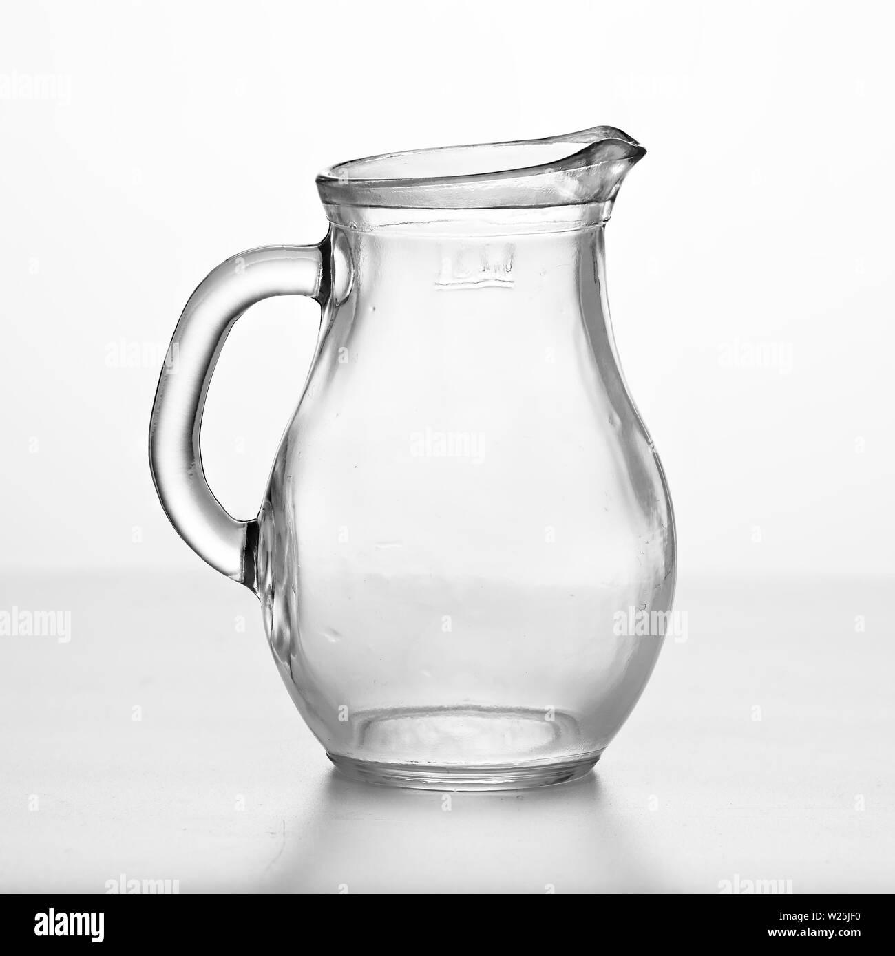 Glass jug isolated on white. Dishes Stock Photo Alamy