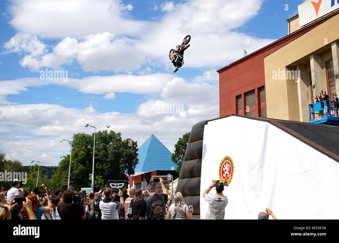 Stunt Fighters show. Rider shows amazing handlebar tricks. Stock Photo