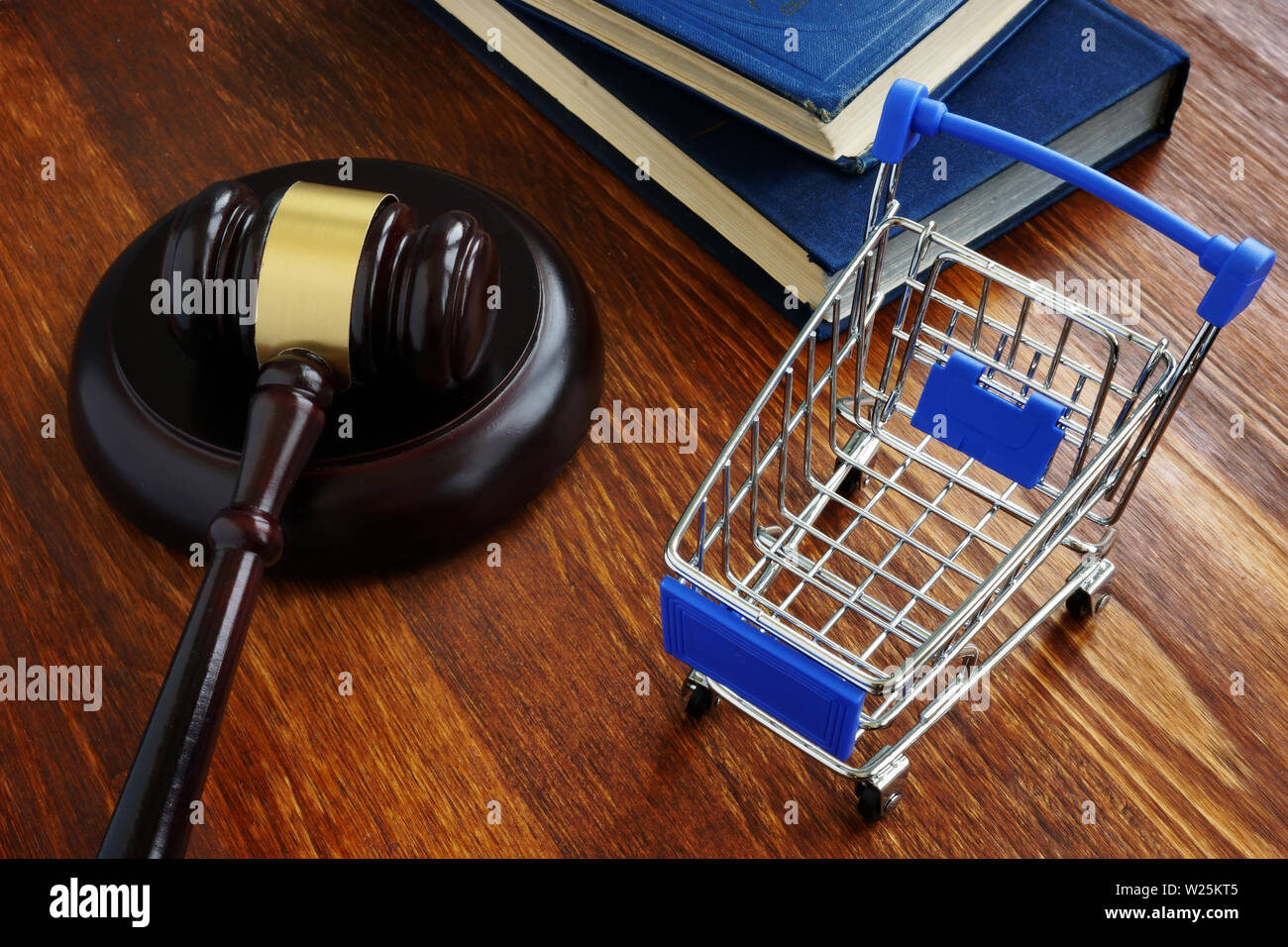 Consumer protection law concept. Shopping cart and gavel Stock Photo Alamy