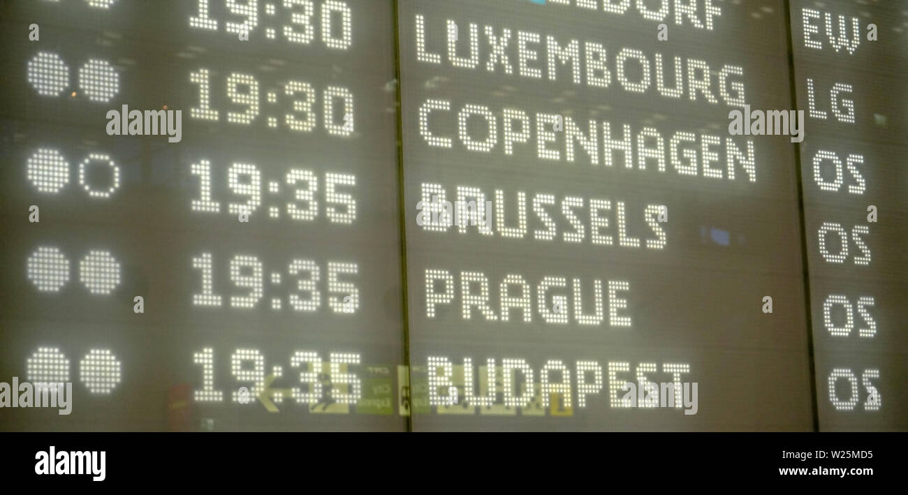 Modern departures board with detail on European cities destinations typed in illuminated letters at Schwechat airport Stock Photo