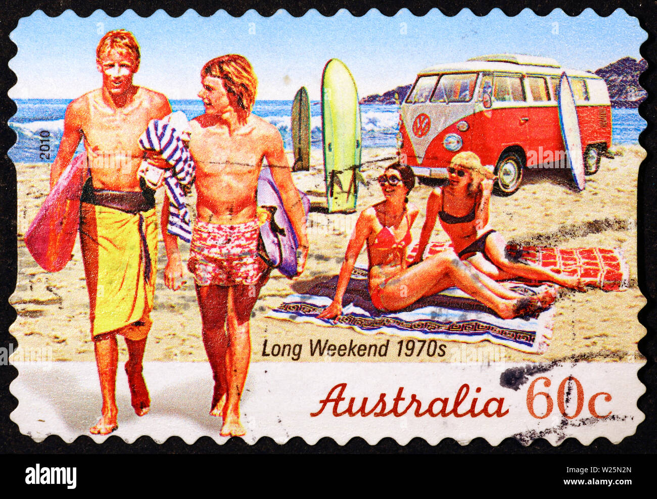 Surfers of the 70's on australian postage stamp Stock Photo