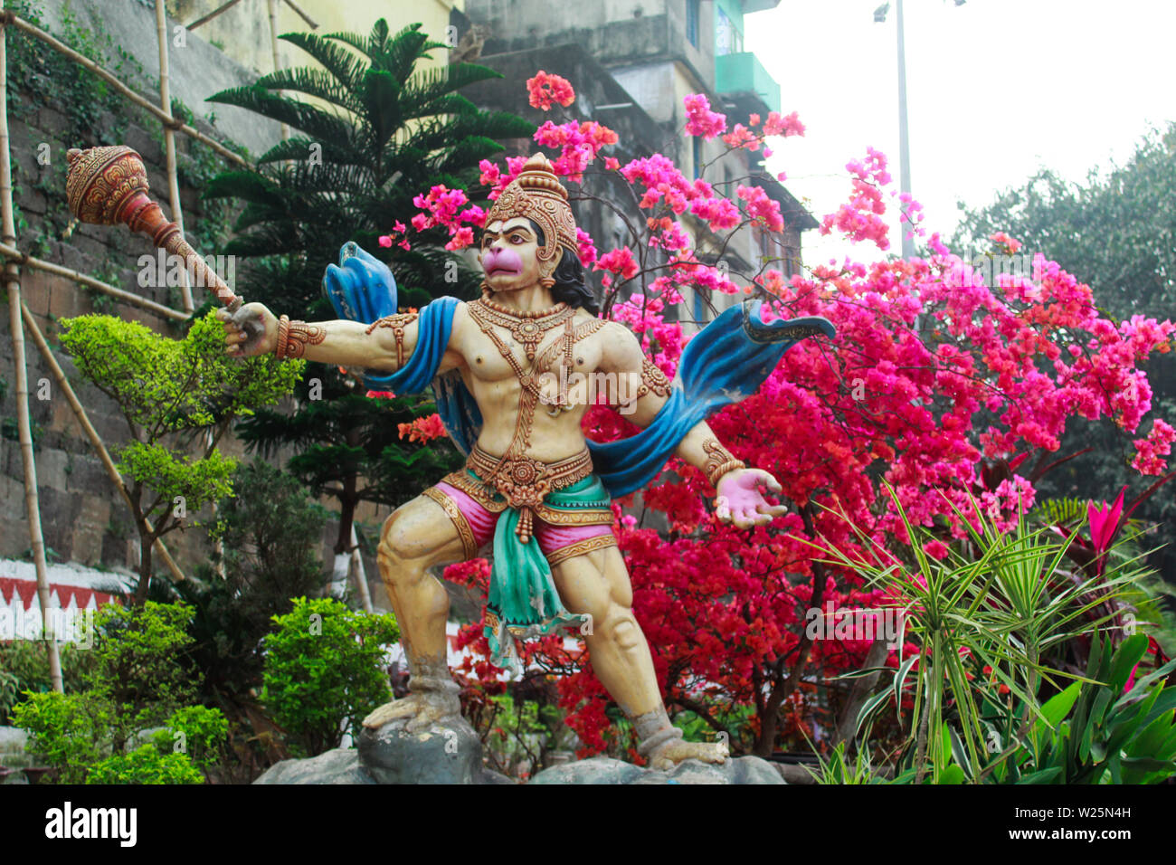 Statue of lord mahaveer in a garden Stock Photo