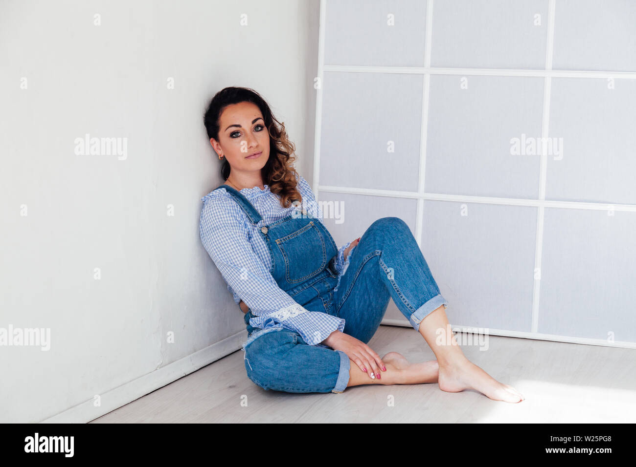 Denim jumpsuit hi-res stock photography and images - Alamy