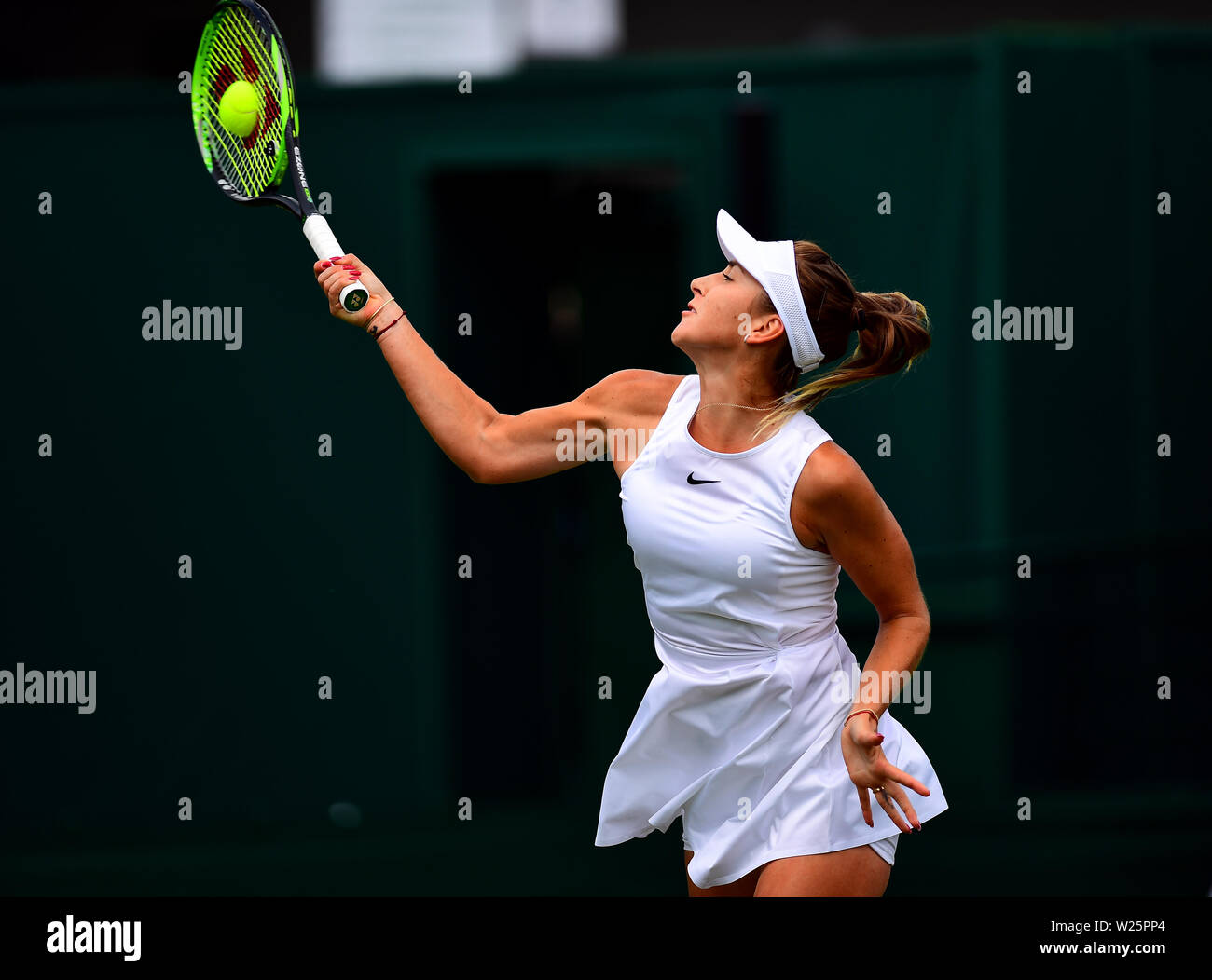 Belinda Bencic in action on day six of the Wimbledon Championships at ...