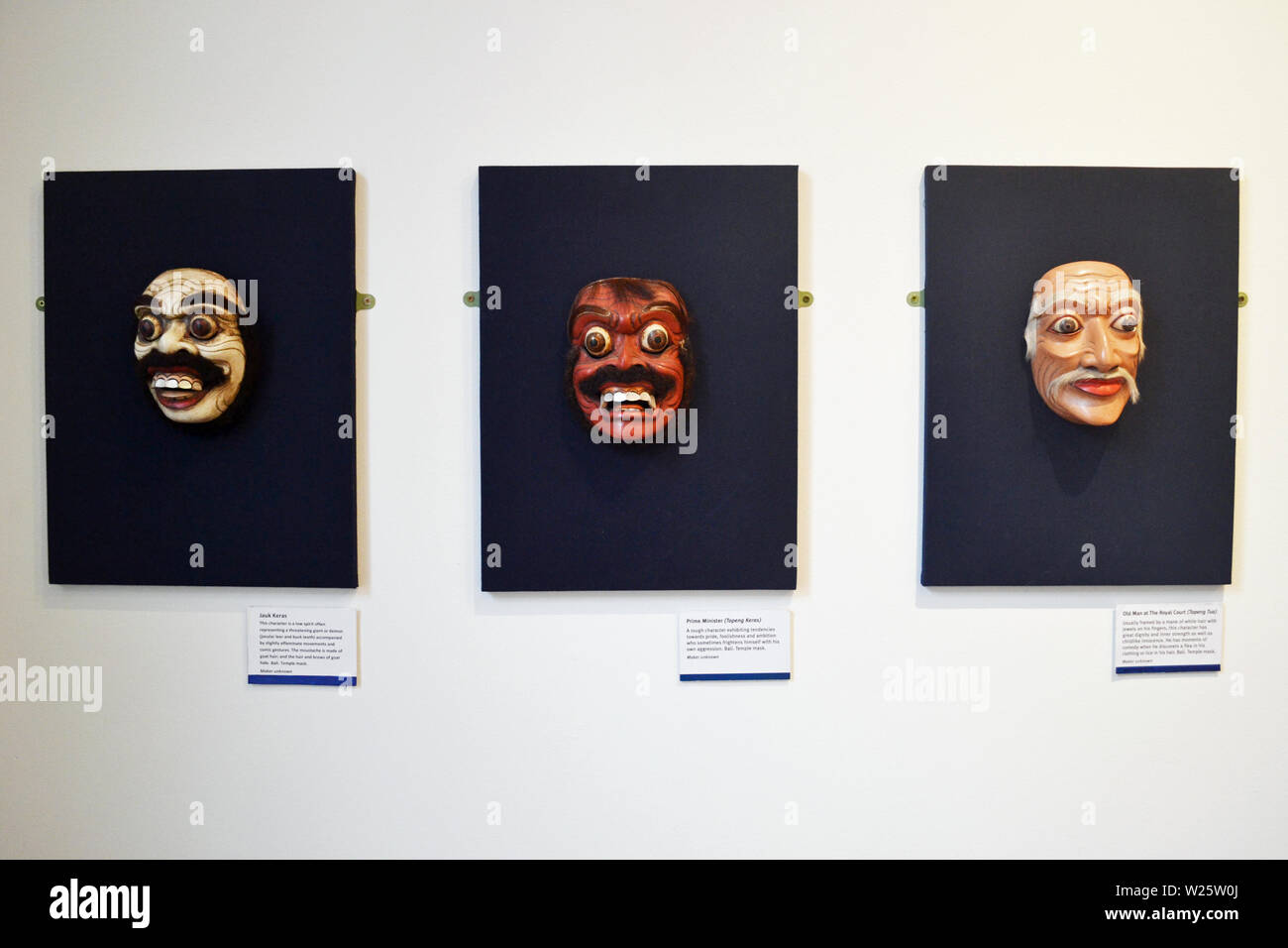 Three Bali Temple Masks in Shrewsbury Museum and Art Gallery, Shrewsbury, Shropshire, UK Stock Photo
