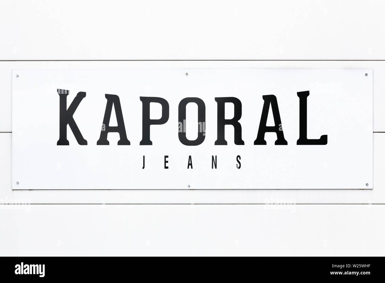 Saint Egreve, France - June 16, 2019: Kaporal logo on a wall. Kaporal Jeans is a French fashion brand founded in 2003 Stock Photo