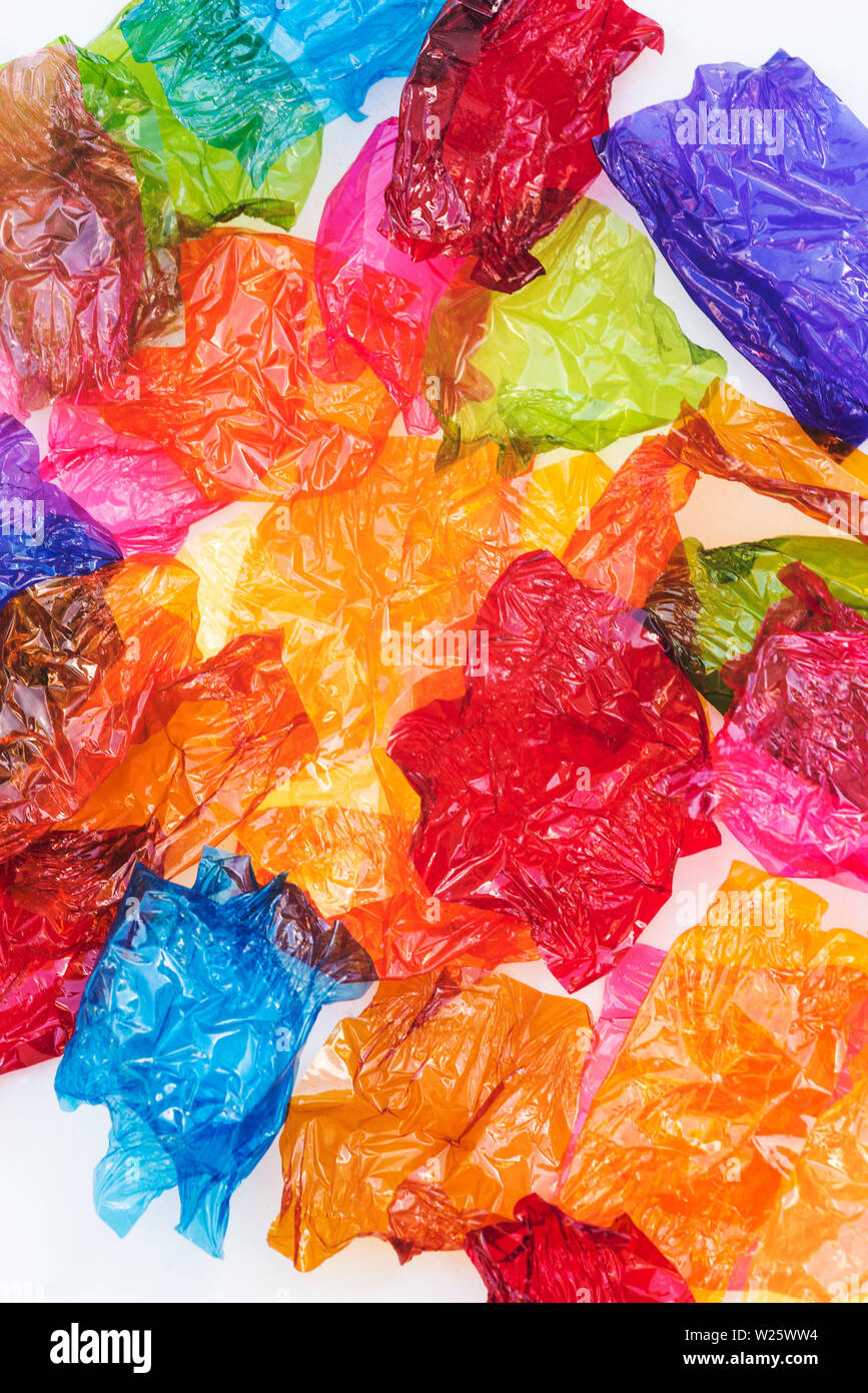 Colourful transparent cellophane sweet wrappers. Stock Photo