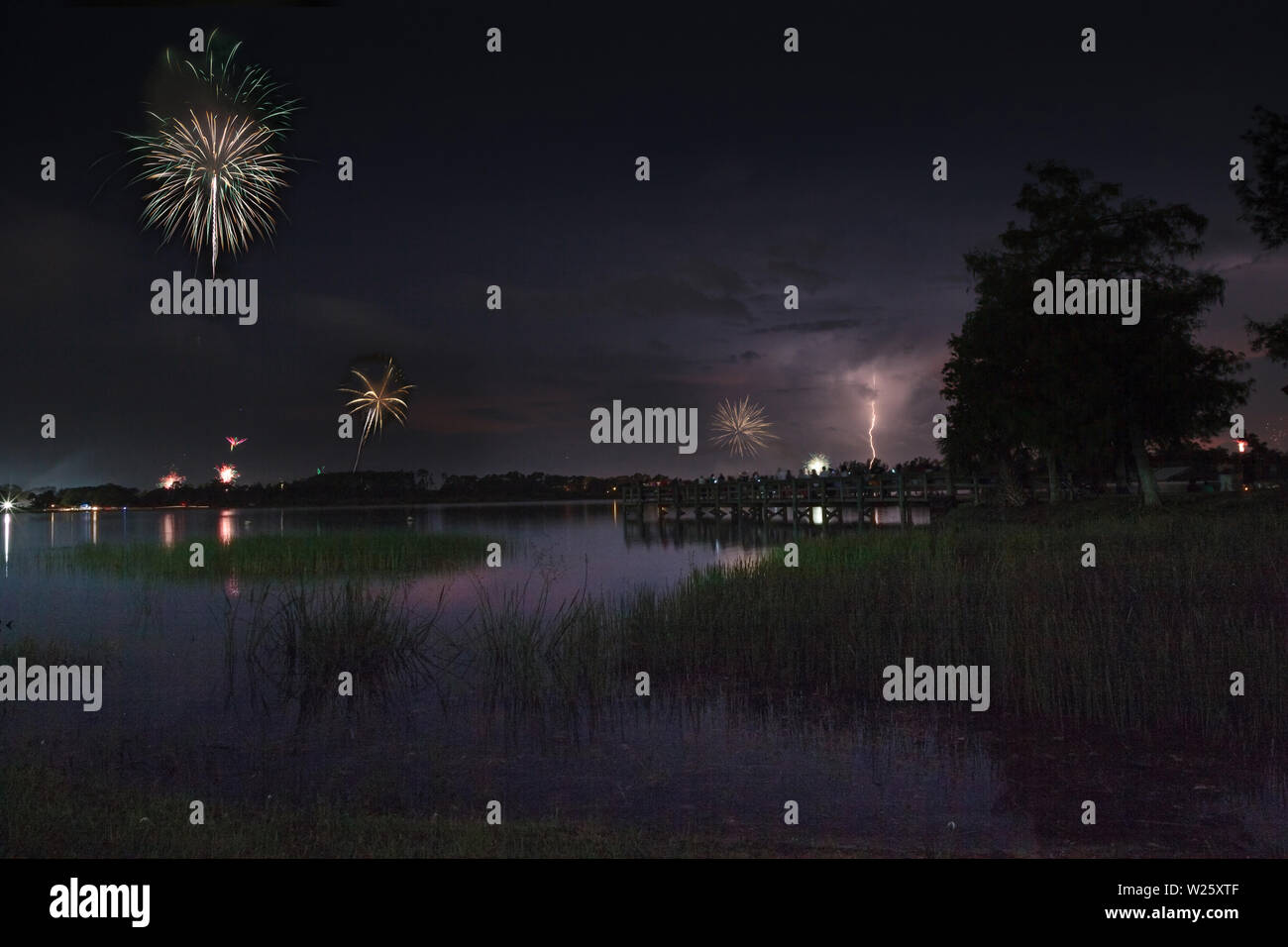 Lightning and Fireworks over Sugden Regional Park in Naples, Florida on