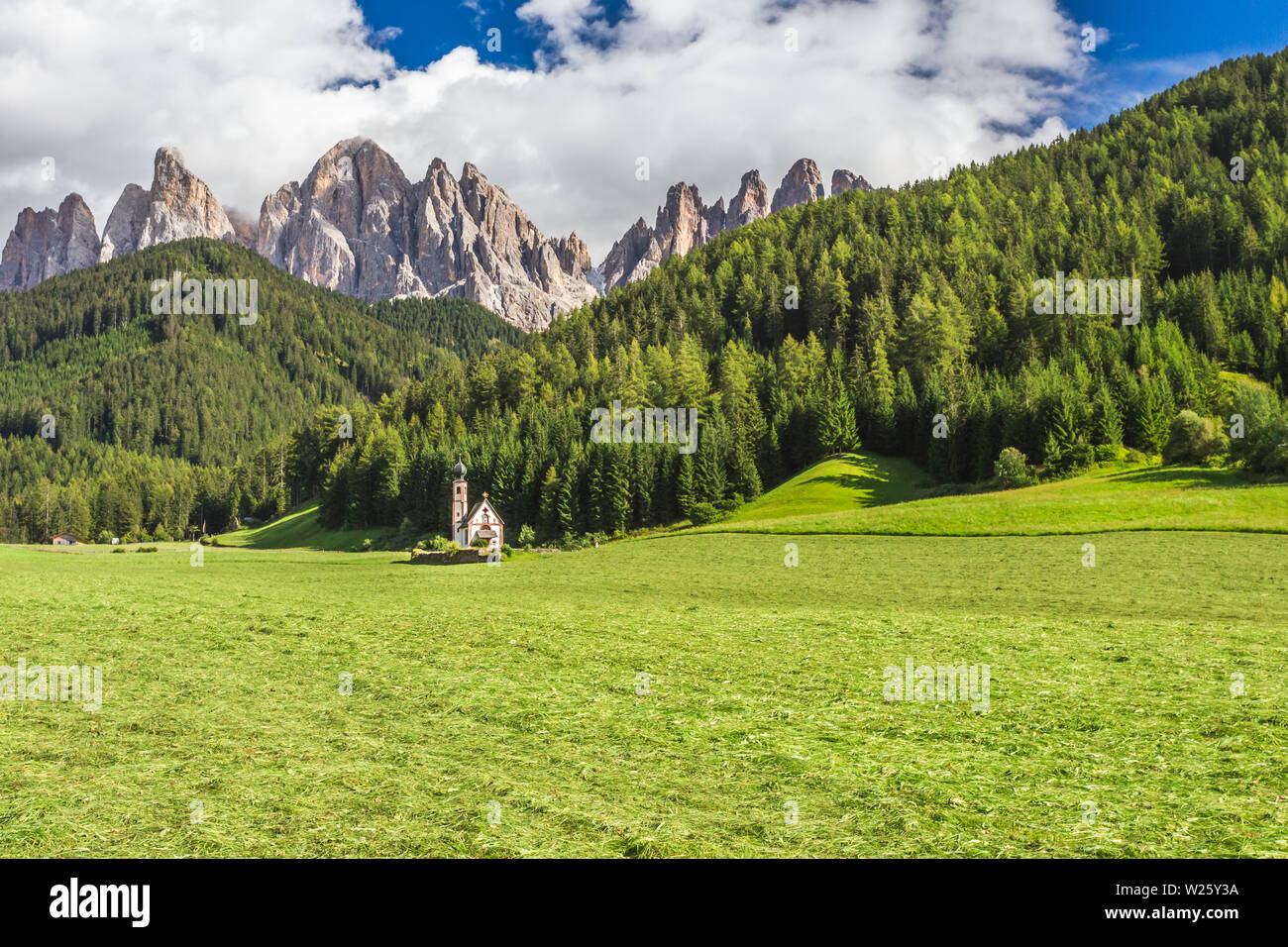 St Johann Church, Santa Maddalena, Tyrol, Dolomites Mountains landscape, Italy Stock Photo