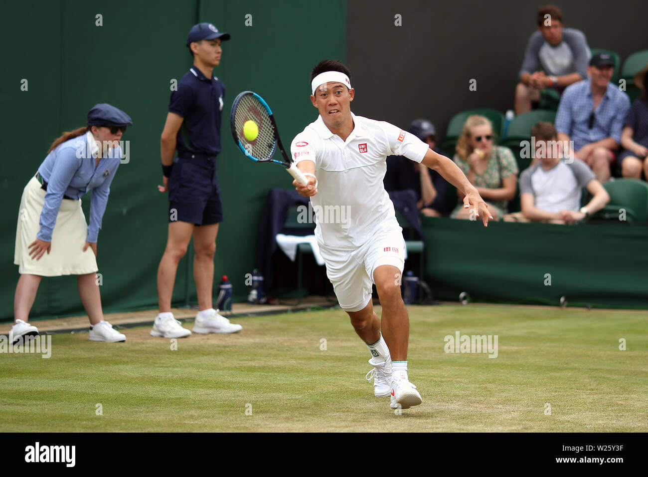 Kei Nishikori on day six of the Wimbledon Championships at the All England Lawn Tennis and Croquet Club, Wimbledon. Stock Photo