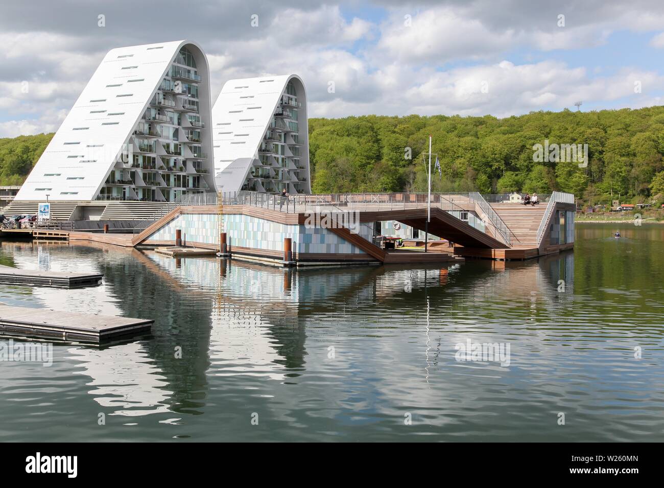 Vejle, Denmark - May 8, 2015: Vejle waterfront in Denmark with wave residential building and kayak club Stock Photo