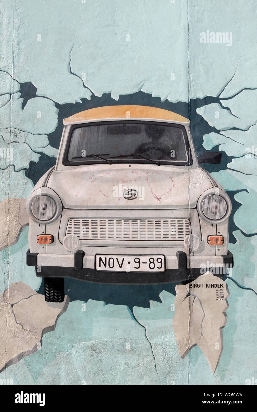 Berlin, Germany - September 9, 2014: Painting from Birgit Kinder of a Trabant in The East Side Gallery, Berlin Wall Stock Photo