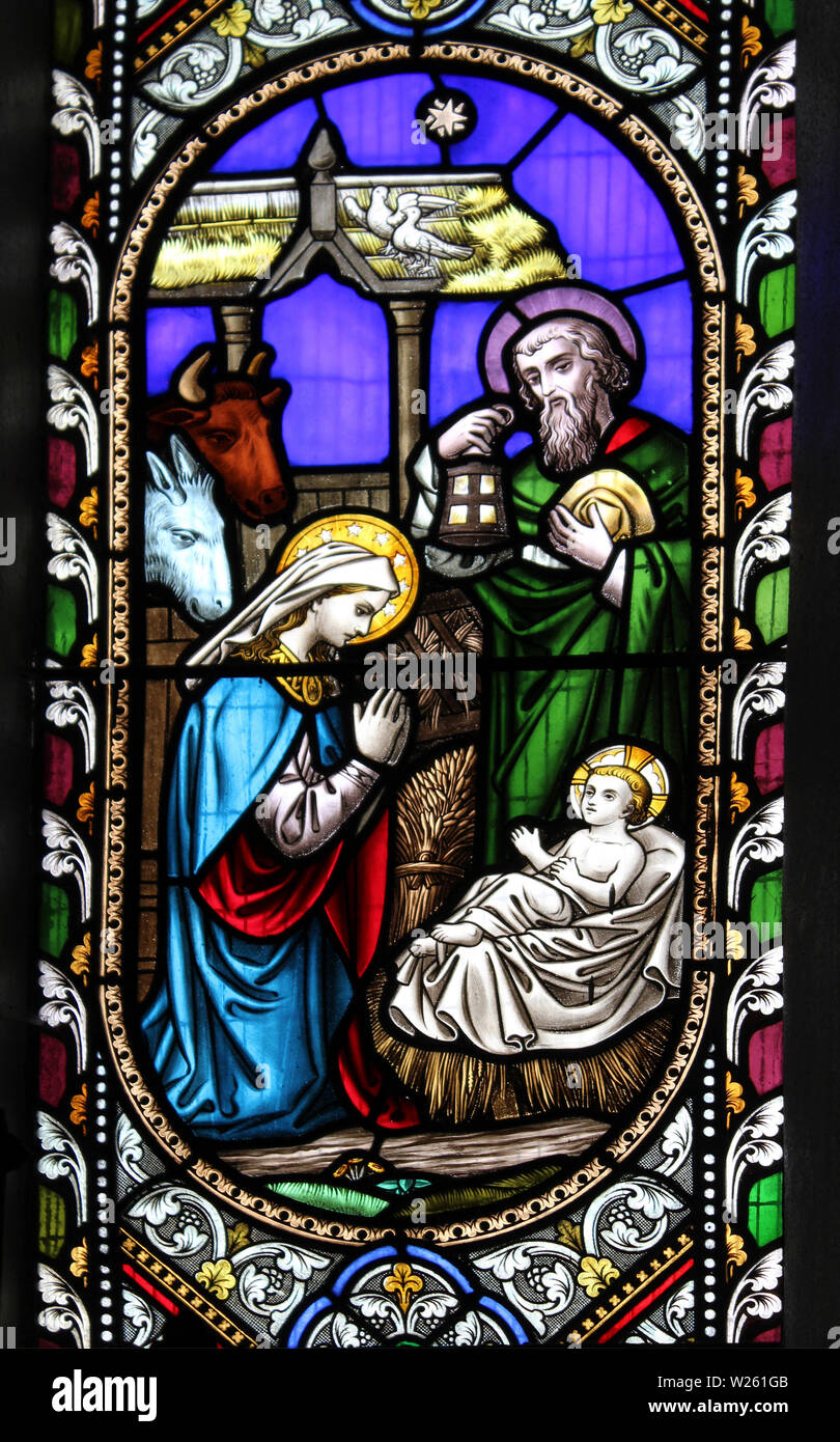 Detail from the stained glass window 'Scenes from the Life of Christ' depicting the Nativity Stock Photo