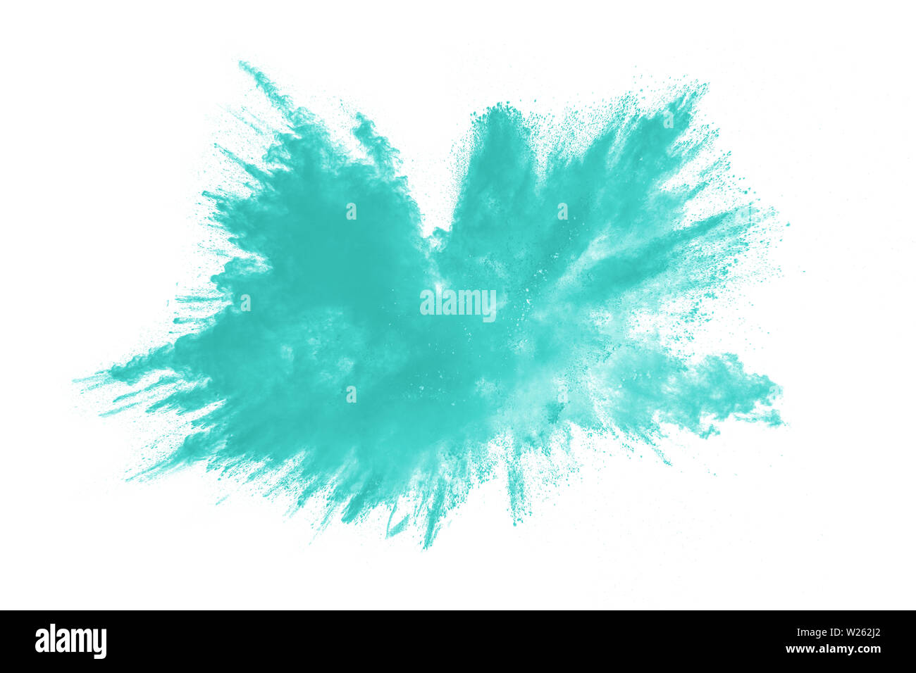 Green dust splash.Green color powder explosion cloud on white background. Stock Photo
