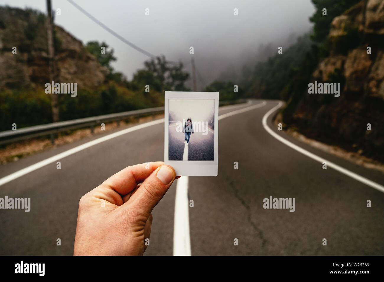 Man walking on winding road hi-res stock photography and images - Alamy