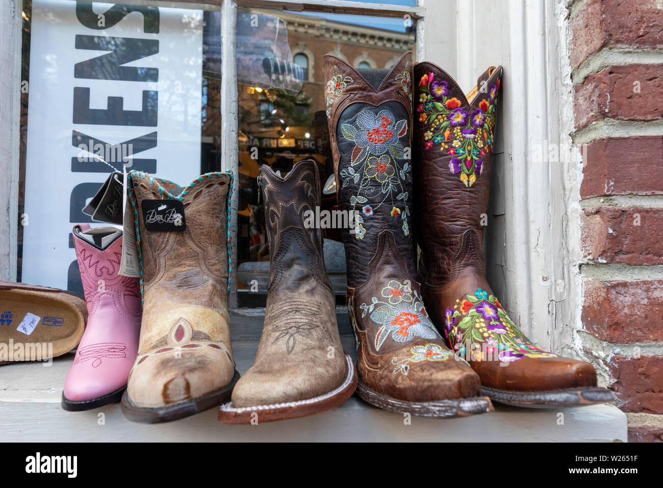 Decorated boots outside a shoe store, Charles Street, Boston, Massachusetts, USA Stock Photo