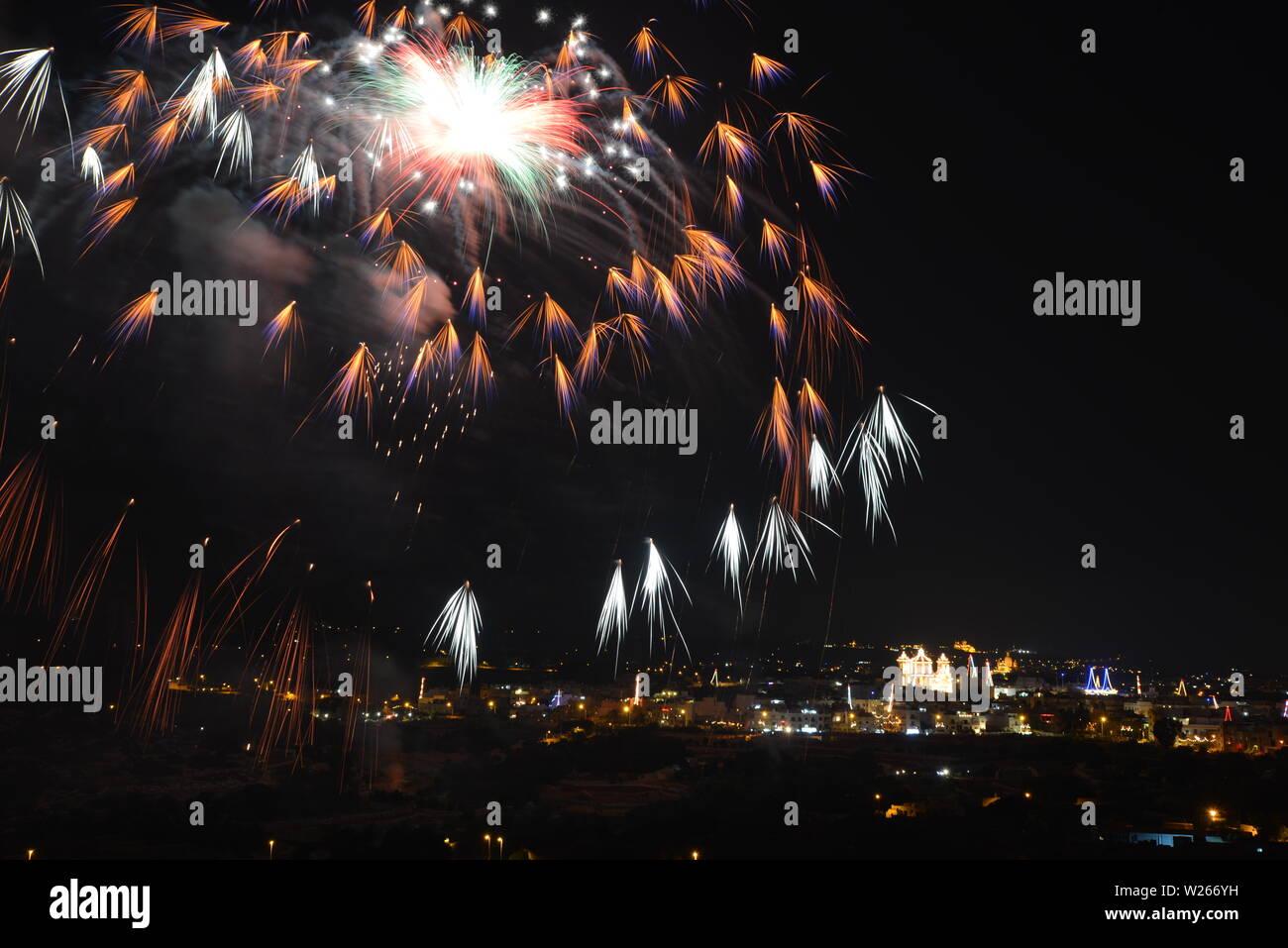 Beautiful fireworks at the Qrendi, Malta village feast in August Stock Photo
