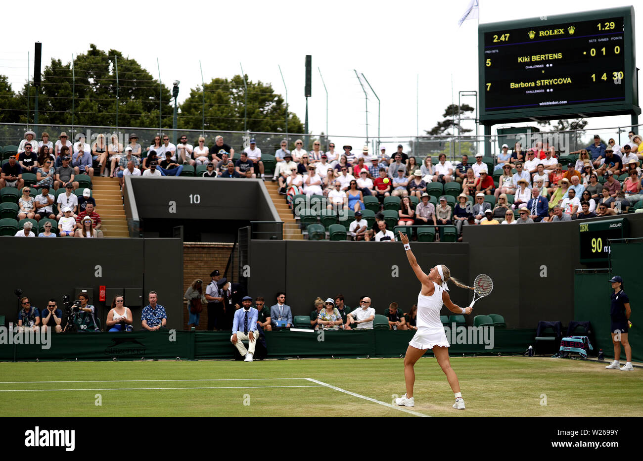 Kiki Bertens in action against Barbora Strycova (not pictured) on day six of the Wimbledon Championships at the All England Lawn Tennis and Croquet Club, Wimbledon. Stock Photo
