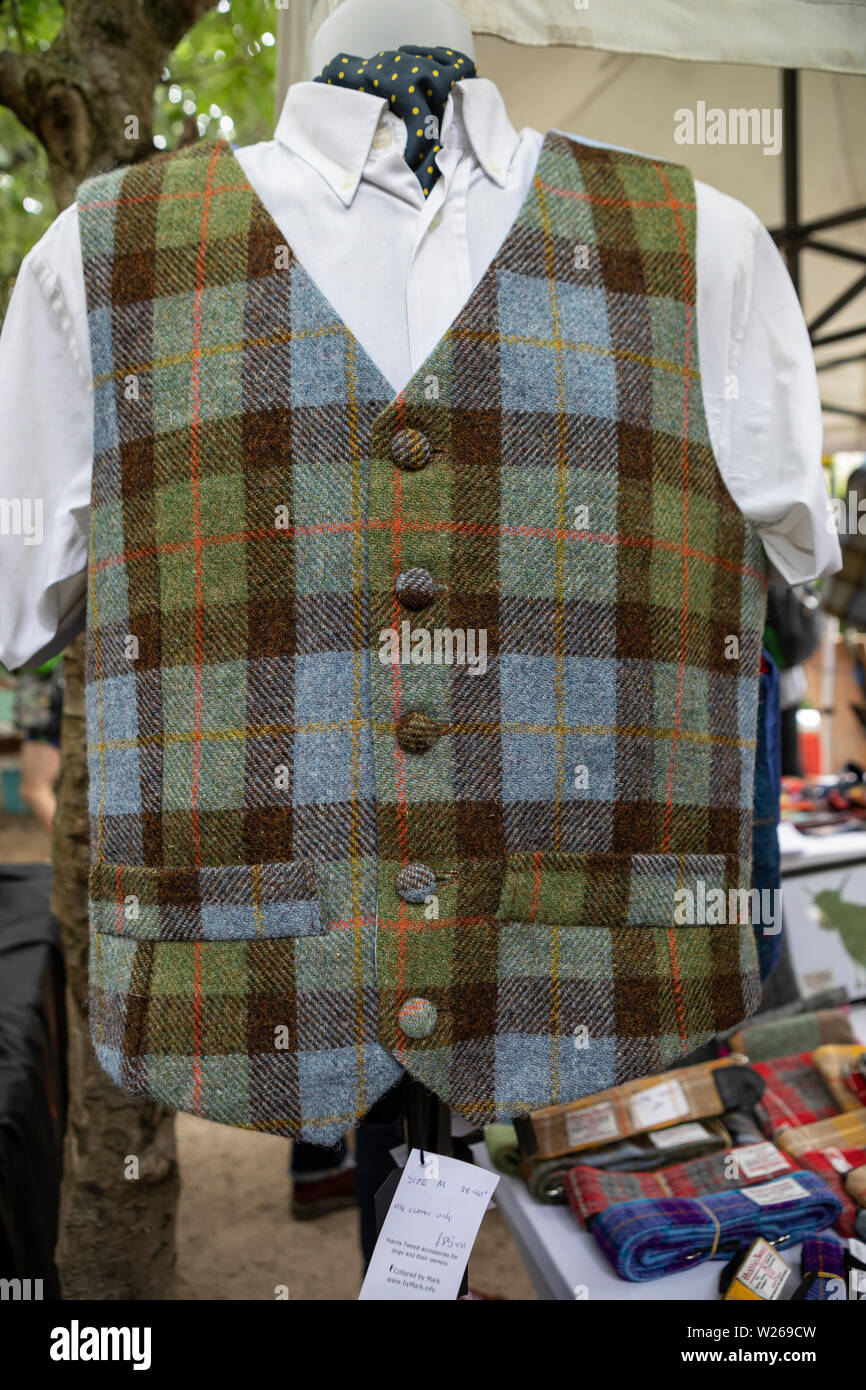 close up of a man gilet made from Harris Tweed in Scottish pattern hanging  on a market stall Stock Photo - Alamy