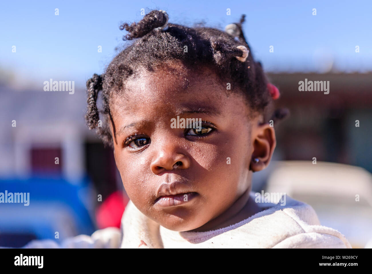 Young girl from a township on the outskirts of Otjiwarongo, Namibia Stock Photo