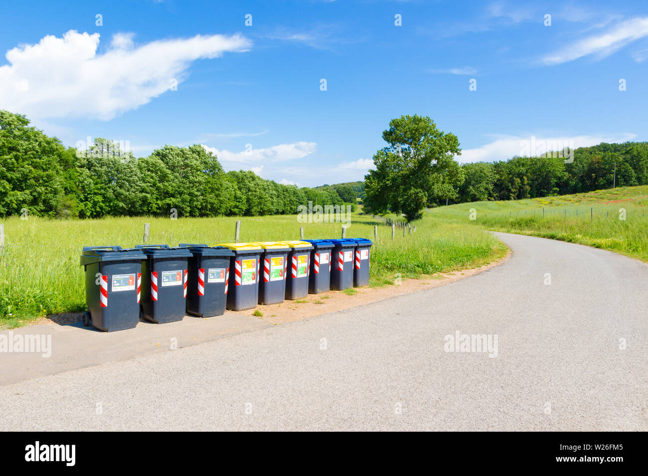 Grosseto, Italy - May 23, 2019: Separate collection of household waste in action in the beautiful tuscan countryside Stock Photo