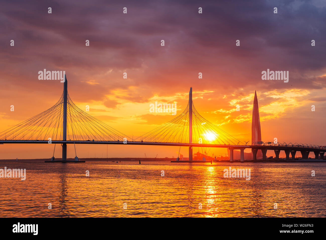 View of the cable-stayed bridge and the bay, in the distance the Lakhta Center building, the tallest building in Europe Stock Photo