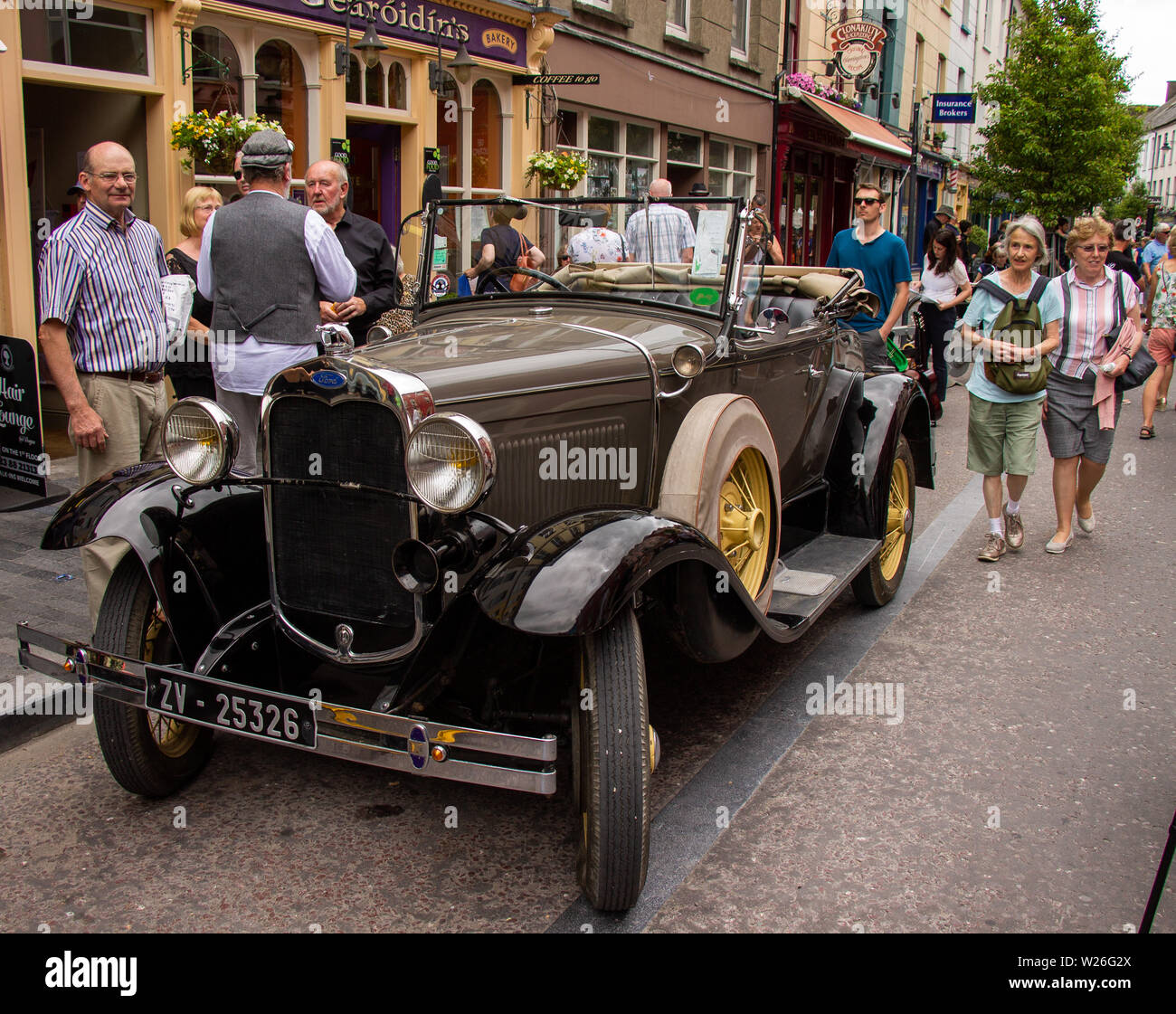 Vintage ford soft top motor car parked on a high street Stock Photo