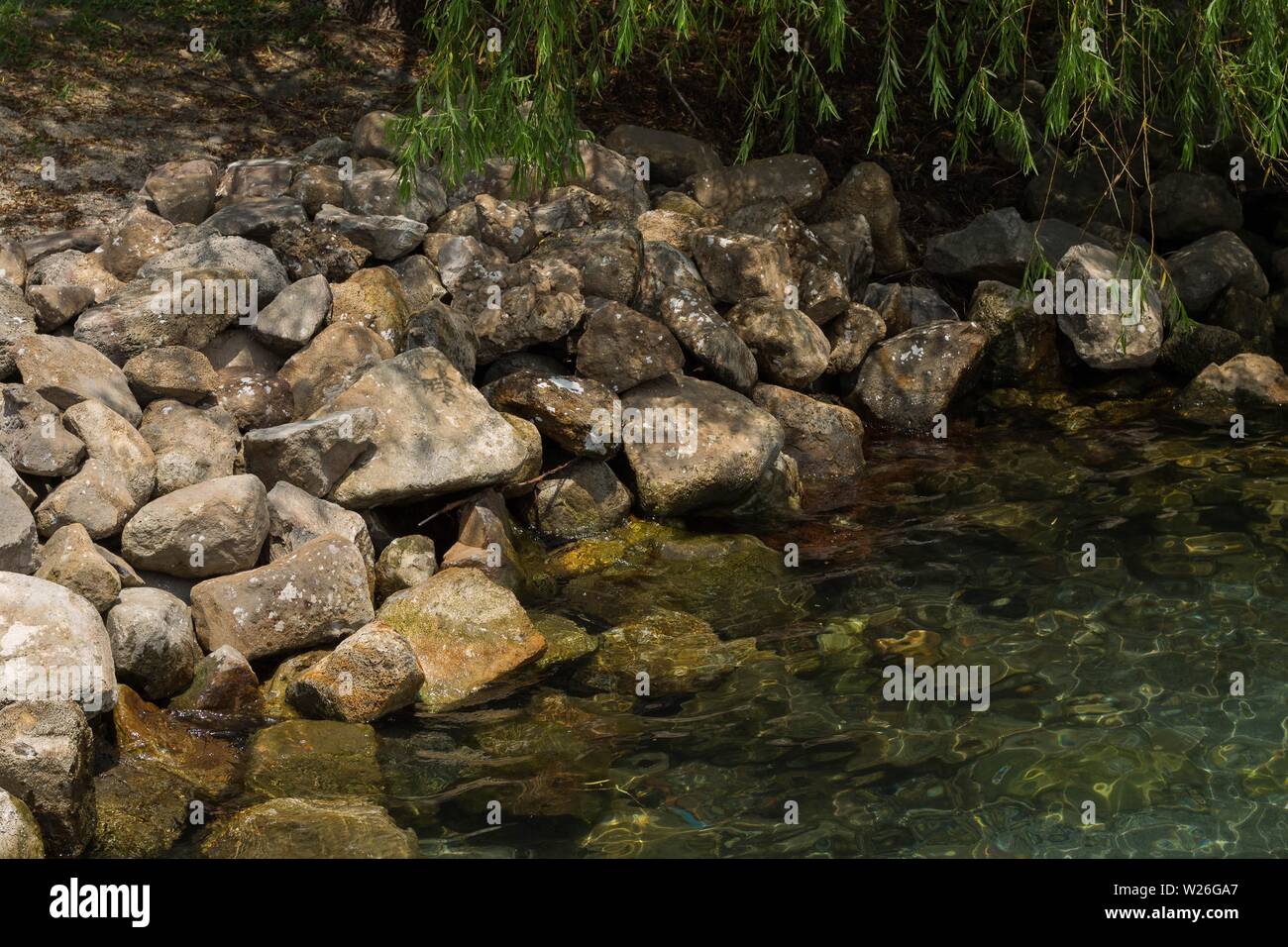 Smooth rocks bottom water hi-res stock photography and images - Alamy