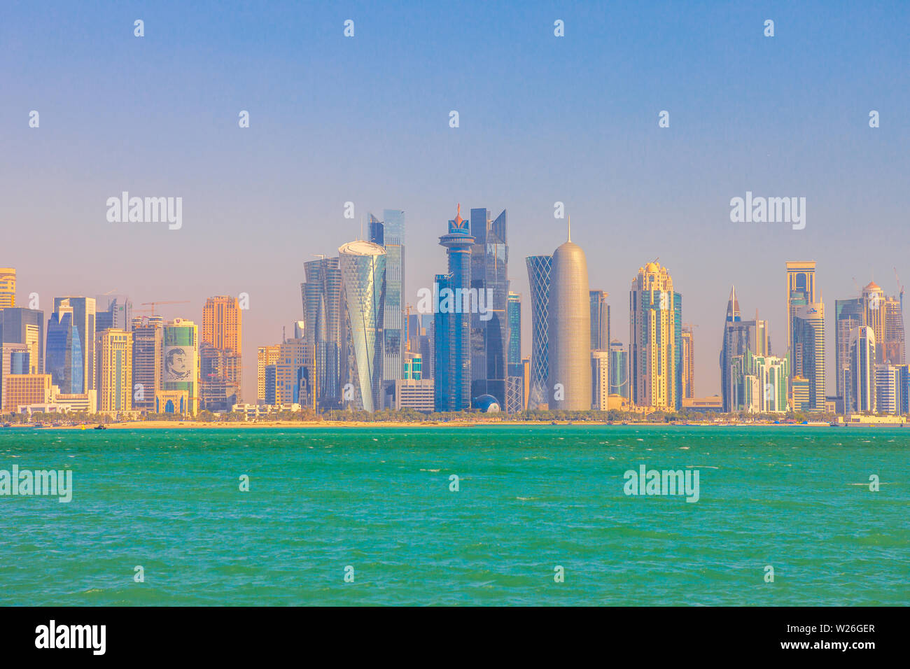 Doha, Qatar - February 20, 2019: seafront of Doha West Bay skyline with Qatar International Exhibition Center, Doha Tower, Salam Tower, World Trade Stock Photo