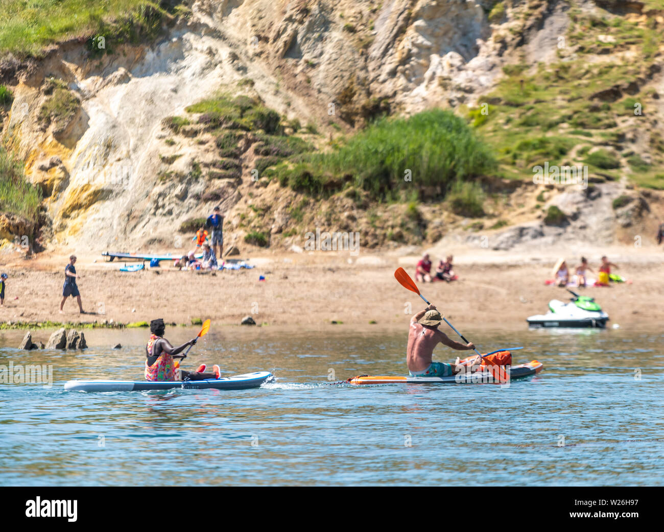 Dorset Coast, UK. 7 July 2019 Visitors enjoying water sports in the