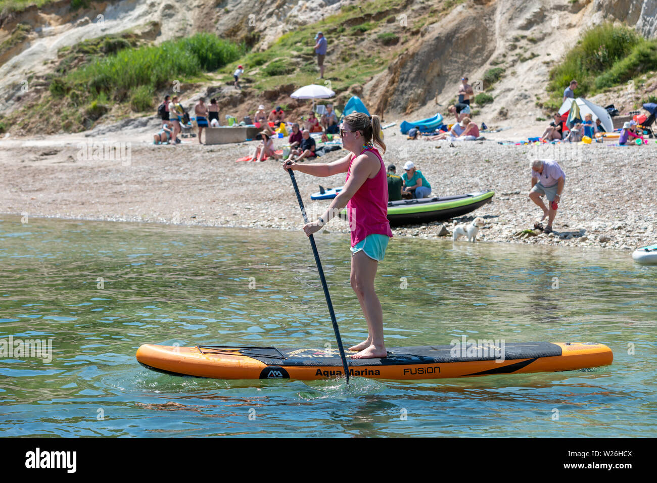 Dorset Coast, UK. 7 July 2019 Visitors enjoying water sports in the