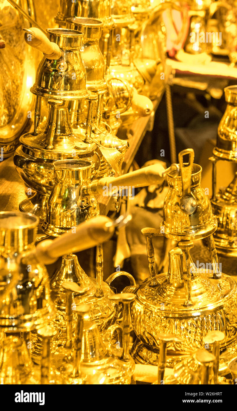 Golden Turkish Coffee pots (ibrik, briki, cezeve) in khan al khalili bazaar in Al Muizz Street, Cairo, Egypt. Stock Photo