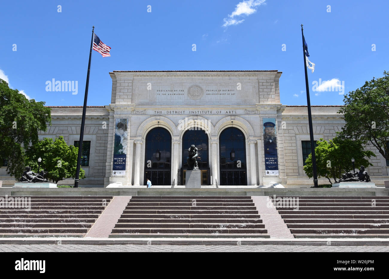 DETROIT, MI / USA - JUNE 30, 2019:  Visitor walks by entrance to the Detroit Institute of Arts Stock Photo