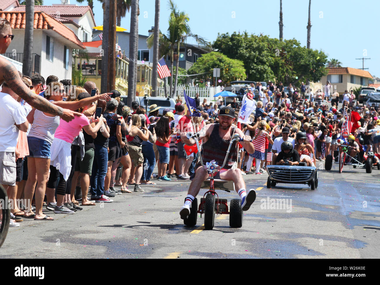 Jul 4, 2019 - San Clemente, California, U.S. - The San Clemente Fourth of July Office Chair Downhill Derby is part soapbox racing, part spring break-style party, where dozens of brave racers modify office chairs, put on costumes and hurl themselves down hill. People attach bicycle handlebars, big rubber wheels, surfboards and whatever else they can find to the framework of a chair in hopes of reaching the bottom in one piece while maximizing speed. Every year there are still a few purists who barrel down the hill on the classic, standard office chair. It's also a water fight! (Credit Image: © Stock Photo