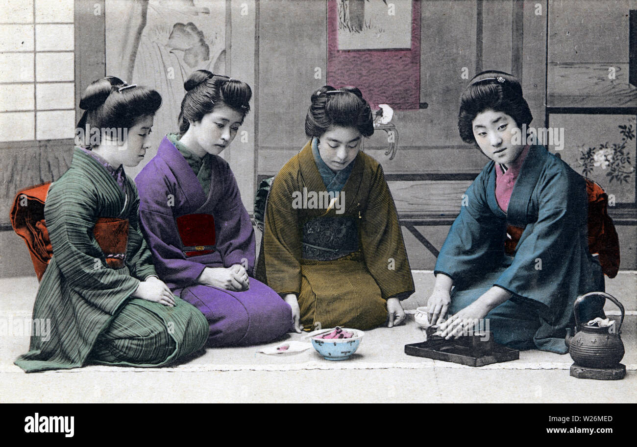 [ 1910s Japan - Japanese Tea Ceremony ] —   Women in kimono and traditional hairstyle enjoying a tea ceremony.  20th century vintage postcard. Stock Photo