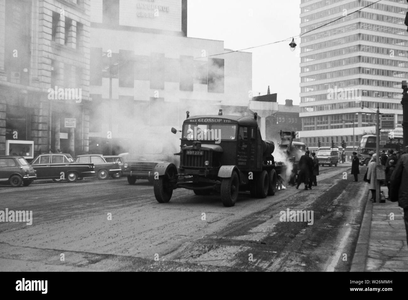 Known as the 'Kings of Tar spraying',W&J Glossop Ltd was a company based in West Yorkshire. The image was taken during the early 1960s The road working vehicle is a Scammell reg no HDT 228 Stock Photo
