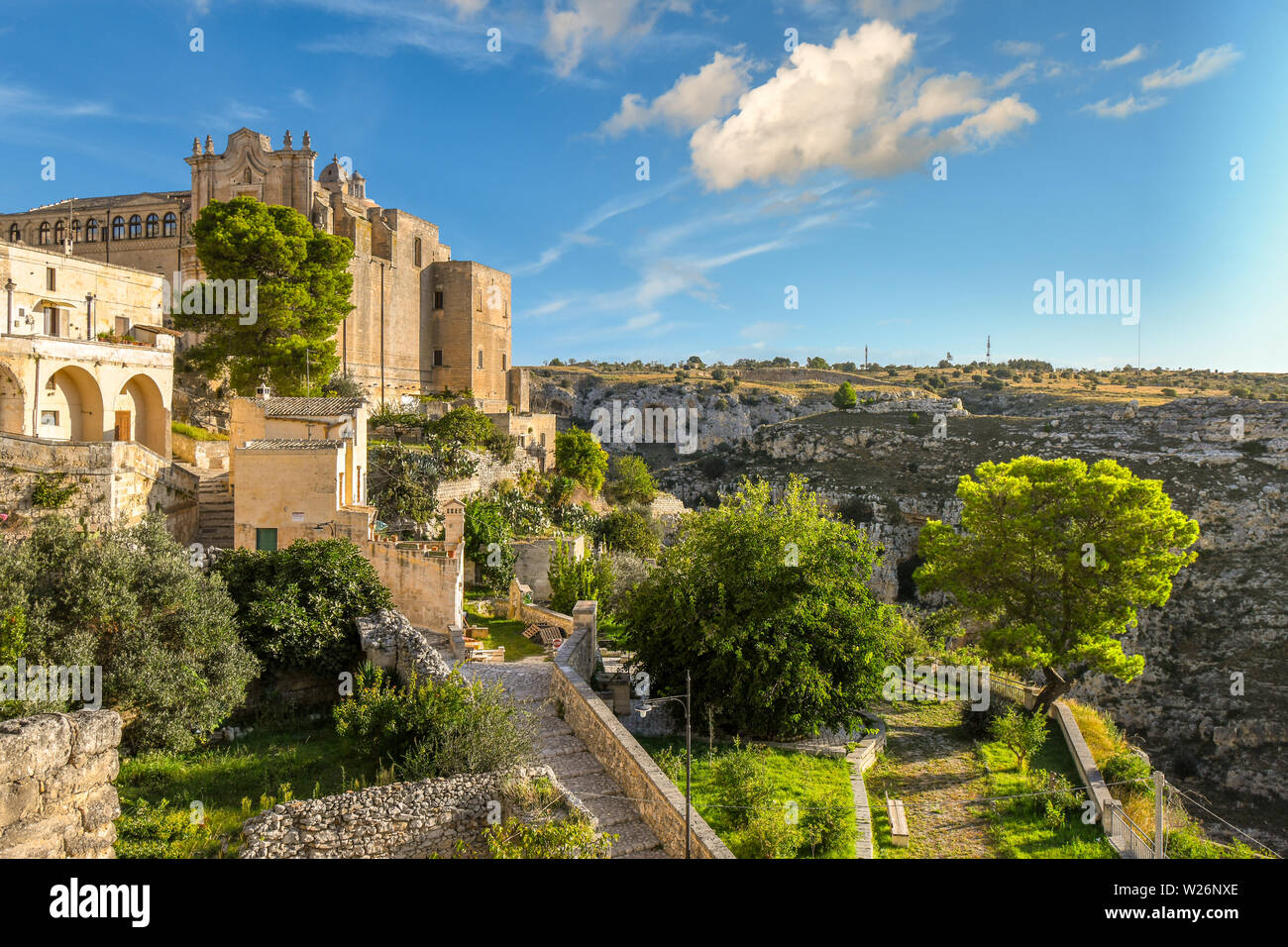 A garden near the Convent of Saint Agostino, overlooking the deep ravine and opposite the sassi cave dwellings in the ancient city of Matera, Italy. Stock Photo