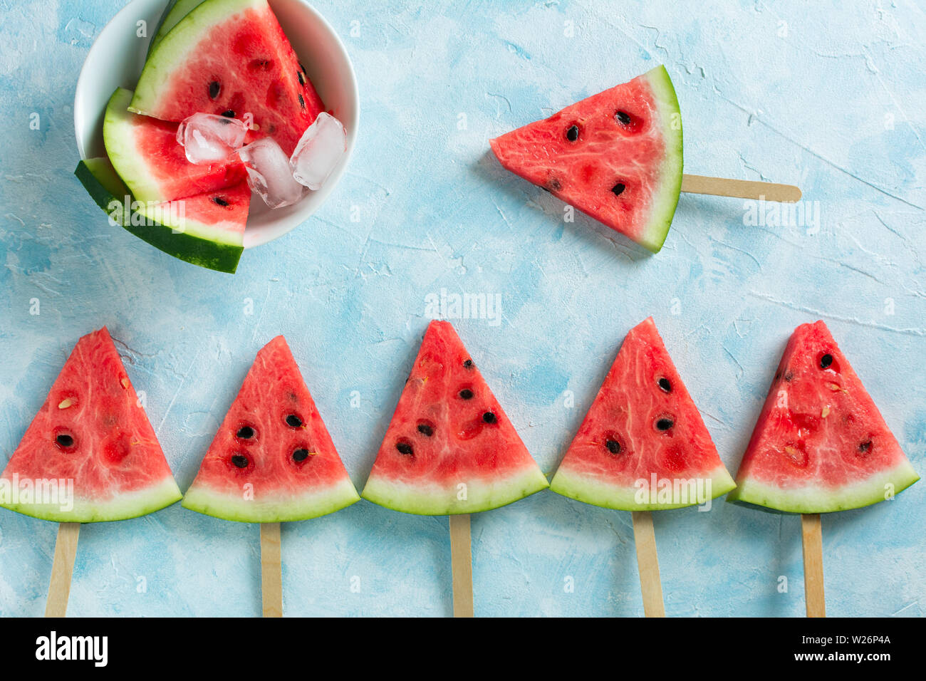 Fruit ice cream sliced watermelon on pastel blue background Stock Photo ...