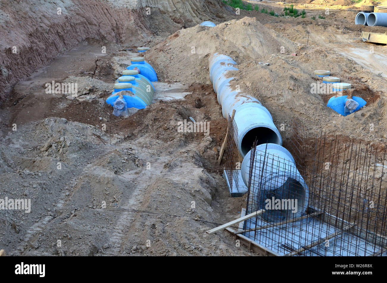 Laying or replacement of underground storm sewer pipes. Installation of