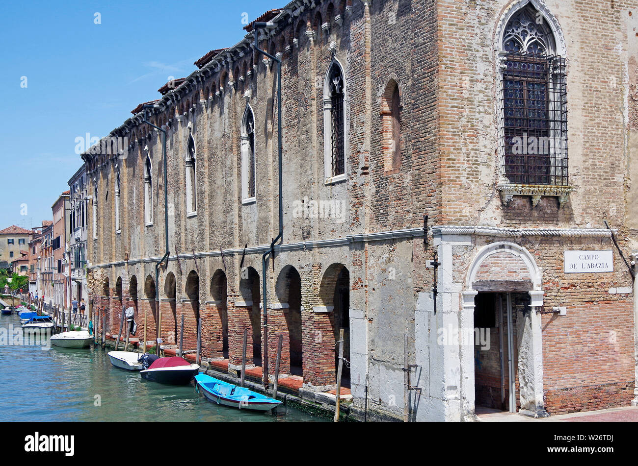 The rather sad-looking Scuola Vecchia della Misericordia, one of the earliest Scuole grandi, founded 1303, built in several phases, the colonnade 1503 Stock Photo