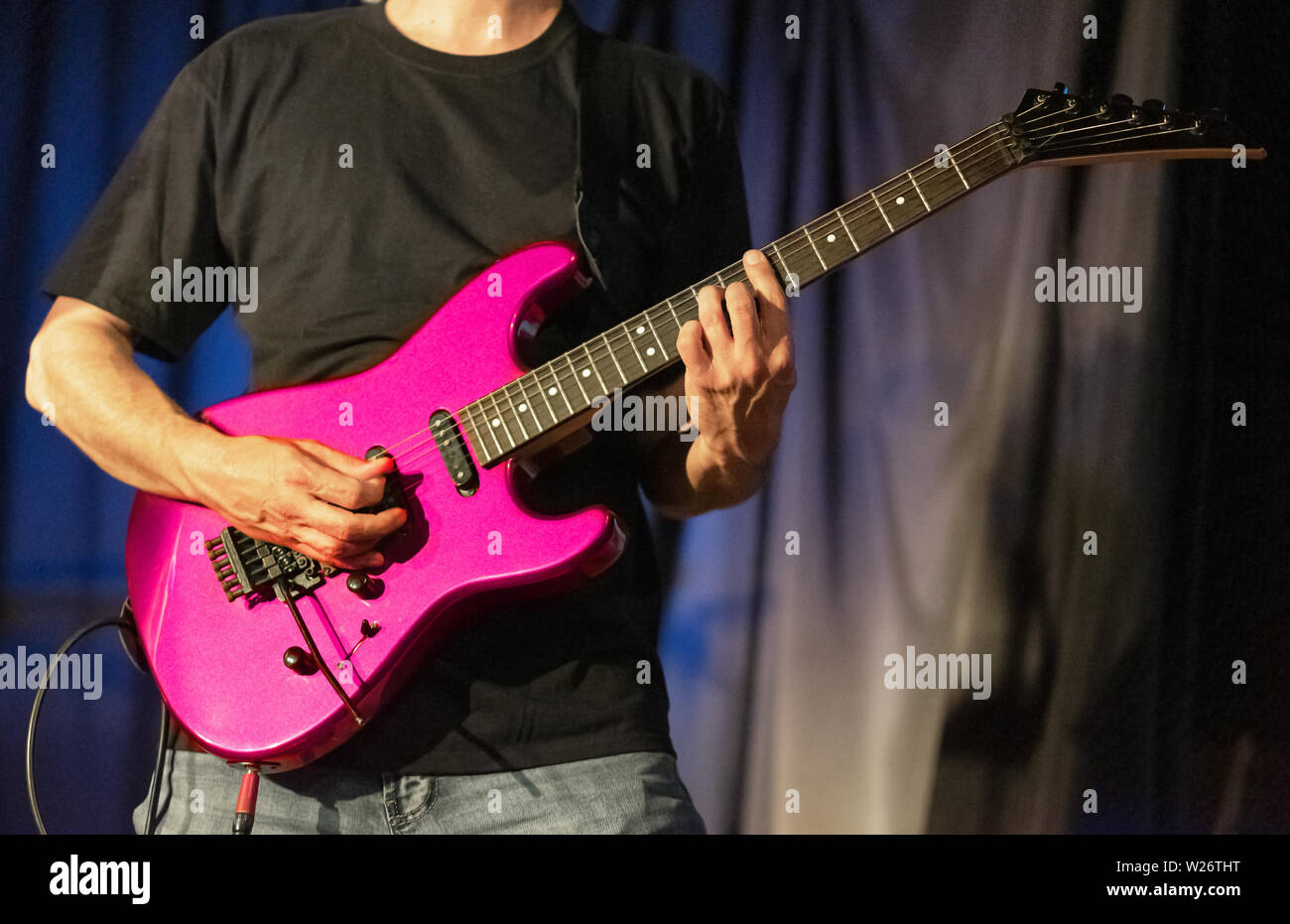 Pink electric guitar hi-res stock photography and images - Alamy