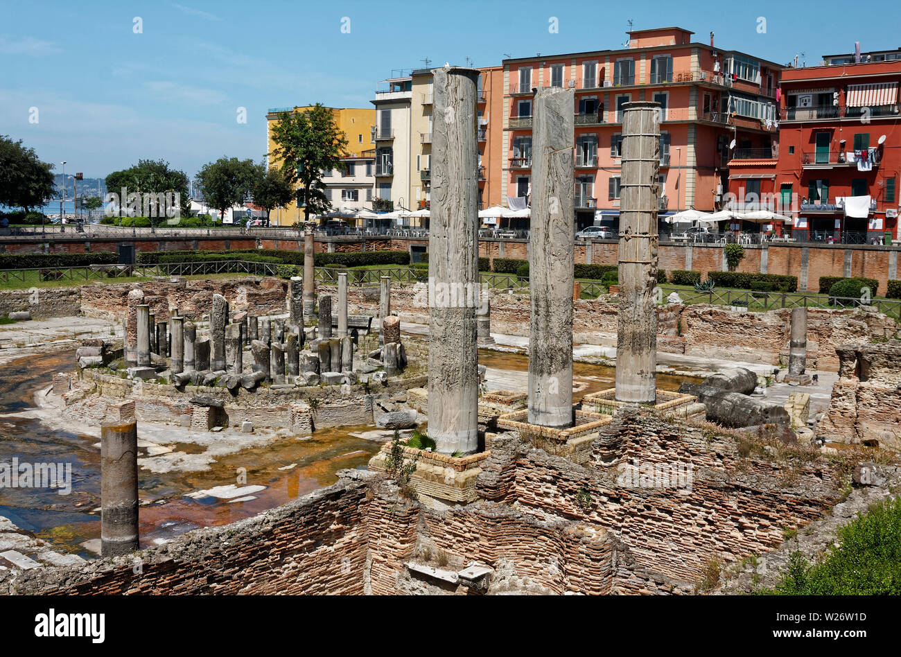 Macellum di Pozzuoli; Tempi di Serepide; ancient market; columns measure  sea level height; 1st century; old ruins; modern buildings, Pozzouli; Italy  Stock Photo - Alamy