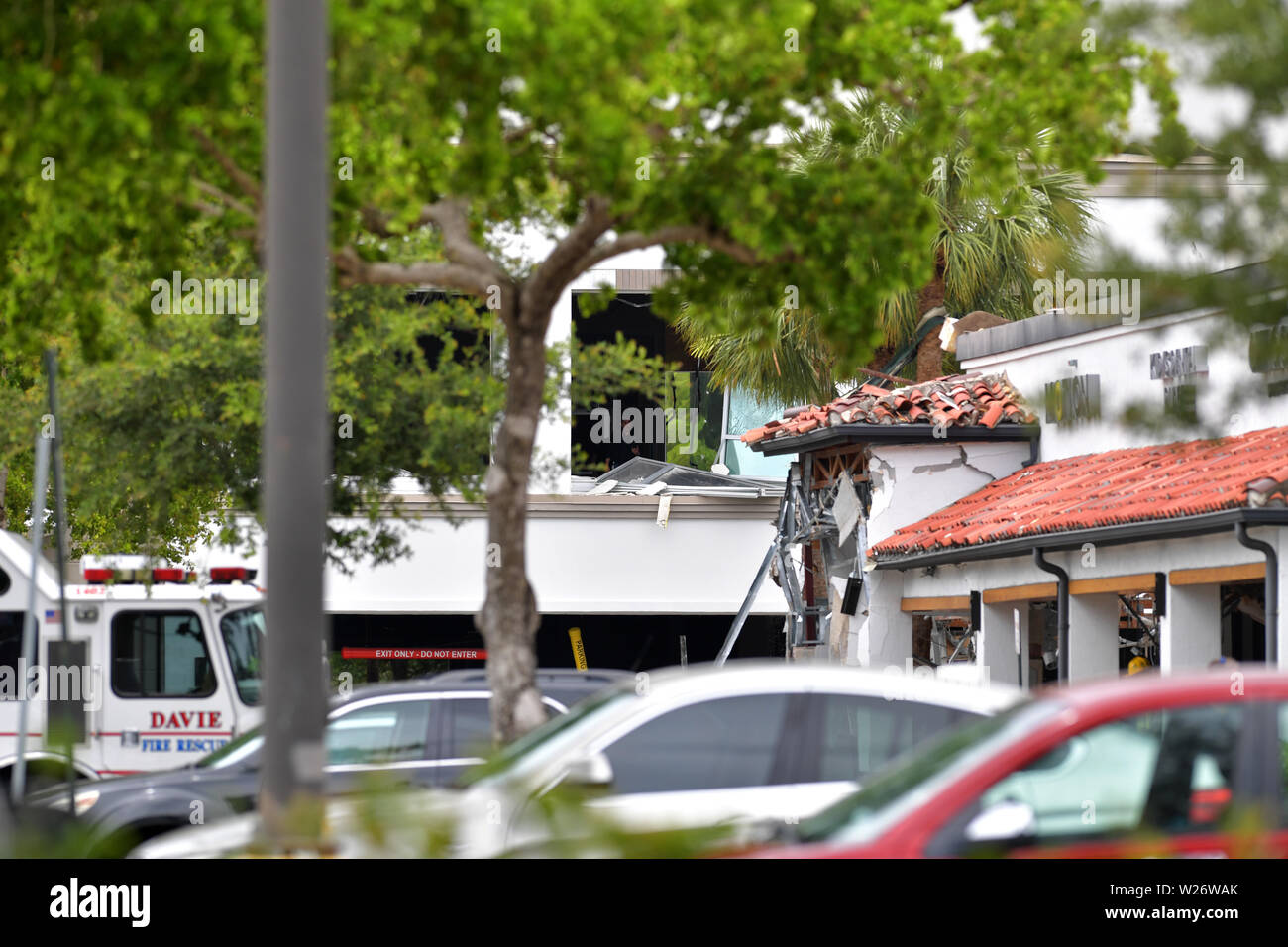 ********** NO New York POST******** PLANTATION, FL - JULY 6: Police and fire crews are combing through the rubble of an explosion that left a Florida shopping center looking like a war zone in Iraq officials said Saturday. The blast was reported at The Fountains shopping center in Plantation, just outside of Fort Lauderdale, Ruptured gas lines were found in the rubble but it has not been confirmed if the blast was caused by a gas leak according to the Plantation Police Department. About 20 people were injured, including two seriously, fire officials said on July 6, 2019 in Plantation, Florida Stock Photo