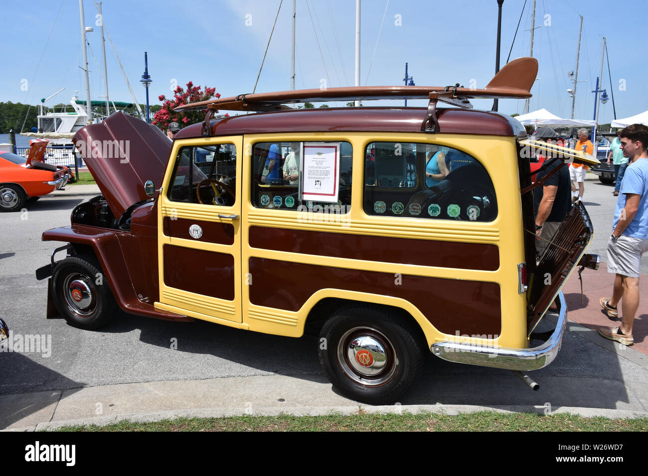 A Vintage Willys Overland station wagon on display at a car show. Stock Photo