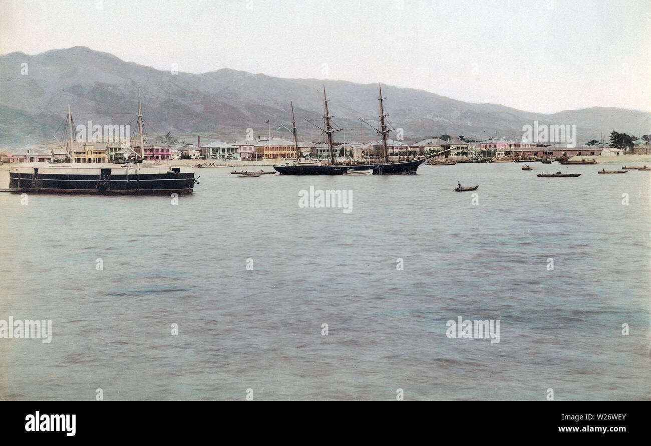 [ 1880s Japan - Kobe Harbor ] —   Ships in Kobe Port. In the background the stately houses on the Bund can be seen.  19th century vintage albumen photograph. Stock Photo